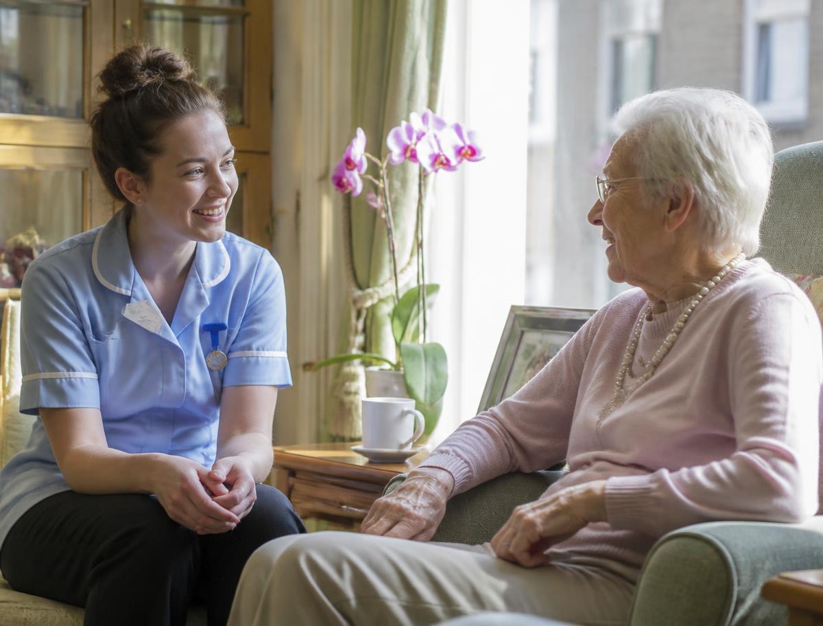 Care home nurse with a resident